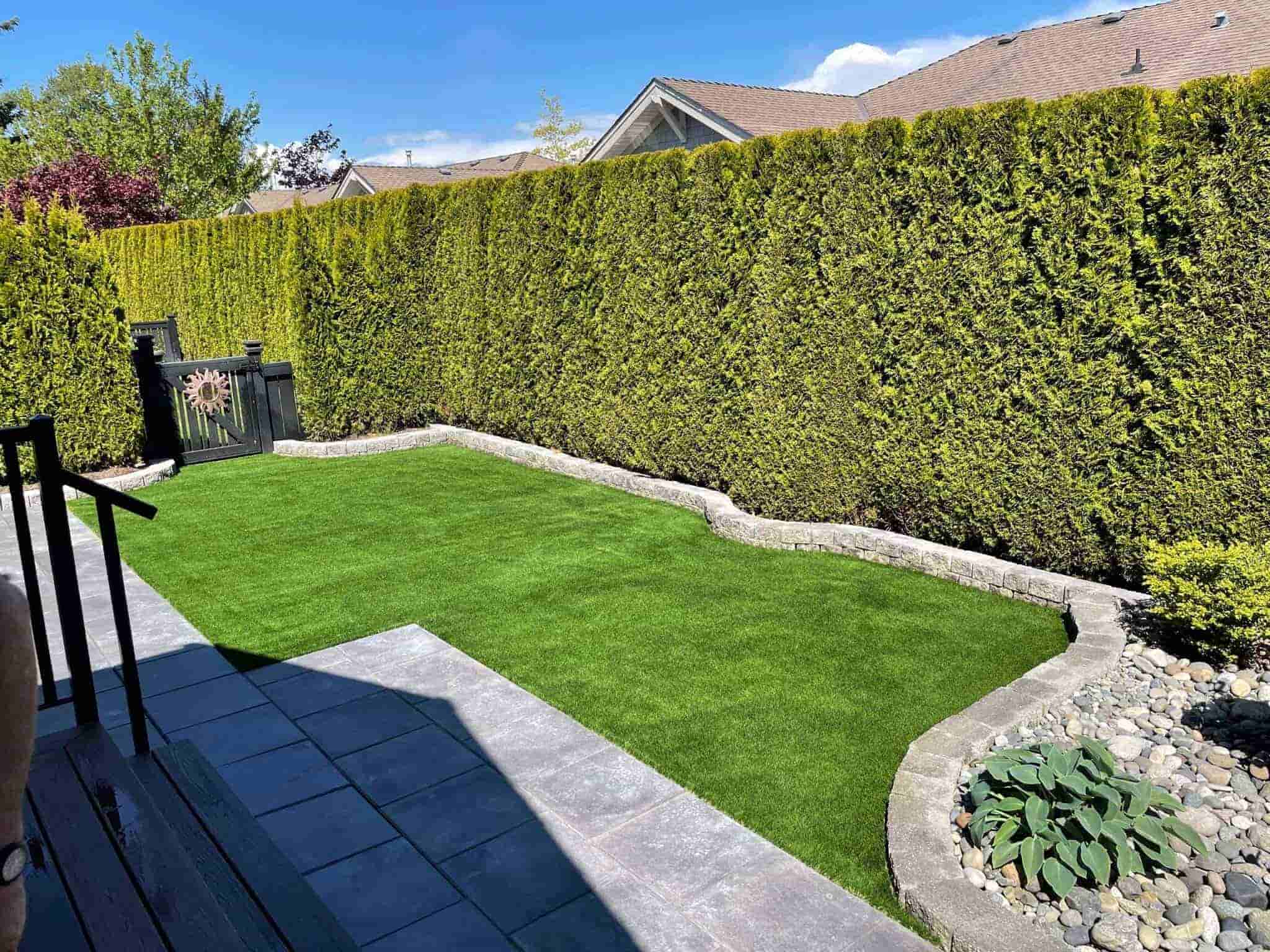 artificial turf installed in a narrow backyard