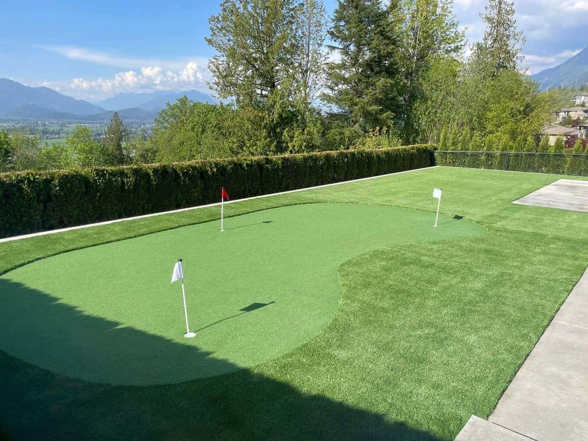 artificial turf installed in a narrow backyard