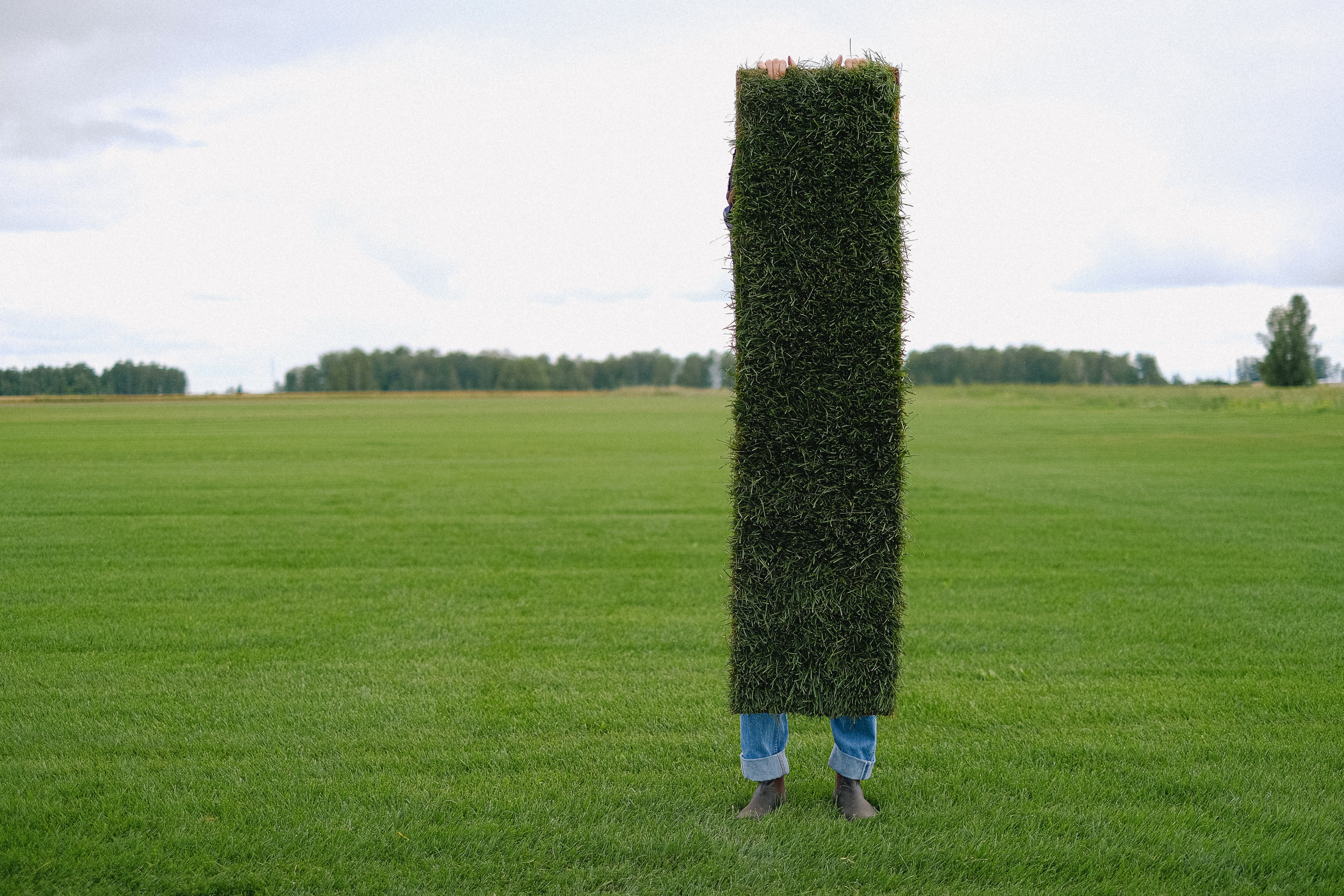 artificial turf installed in a narrow backyard